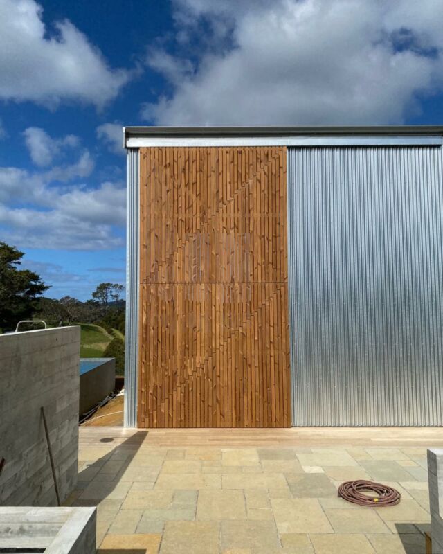 Oversized sliding screens in @lunawood.official on our Woolshed project provide protection from the elements and a nod to the scale and functionality of the original woolshed